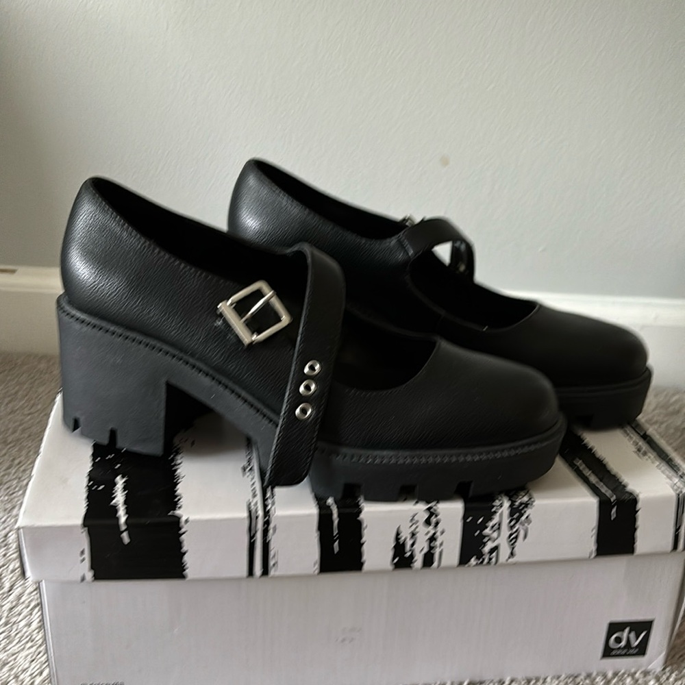 Dolce Vita 7.5 black buckle platforms
